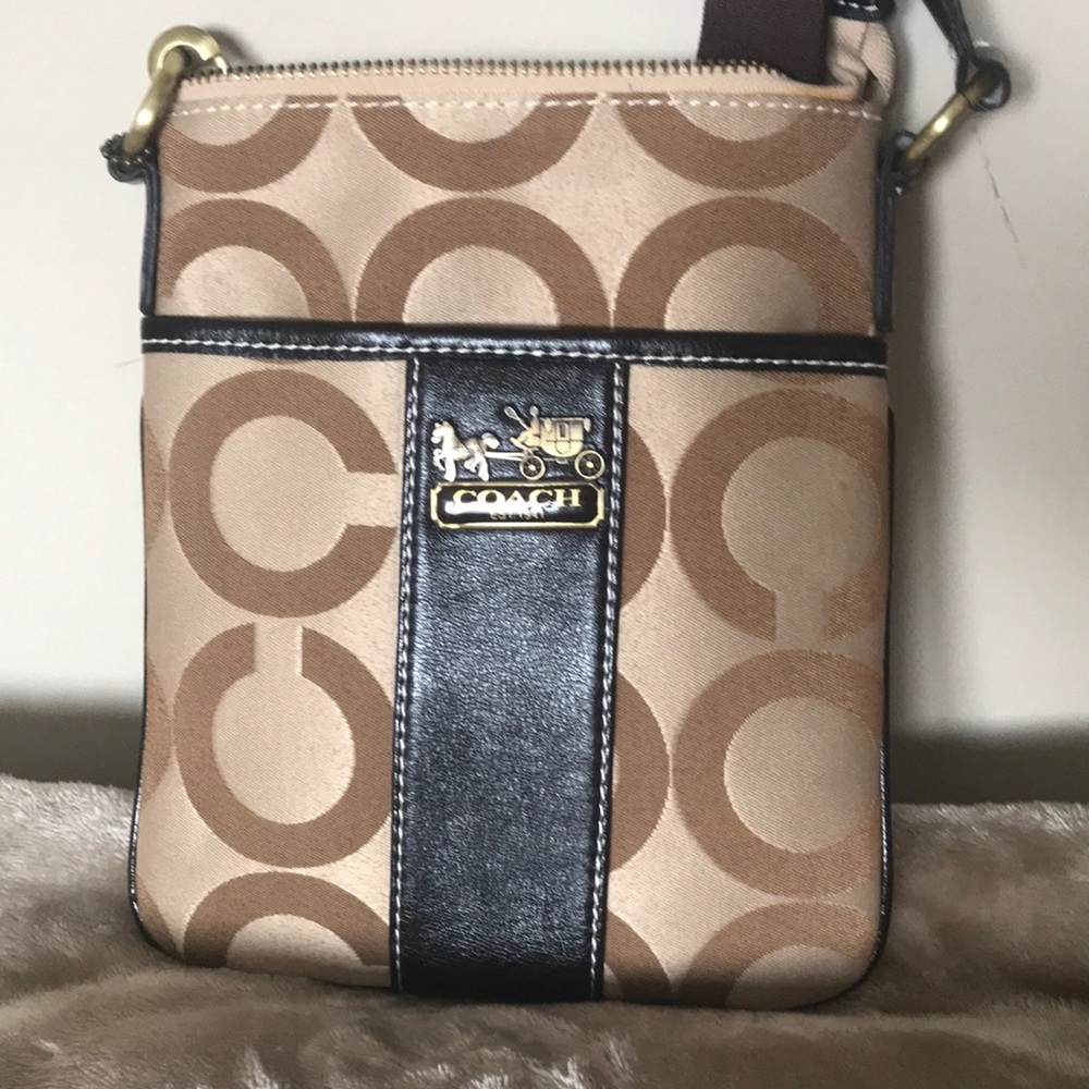 Small traveling Coach purse